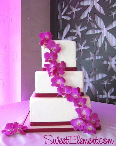 Close up shot of the Cascading Orchid Wedding Cake Leave a comment